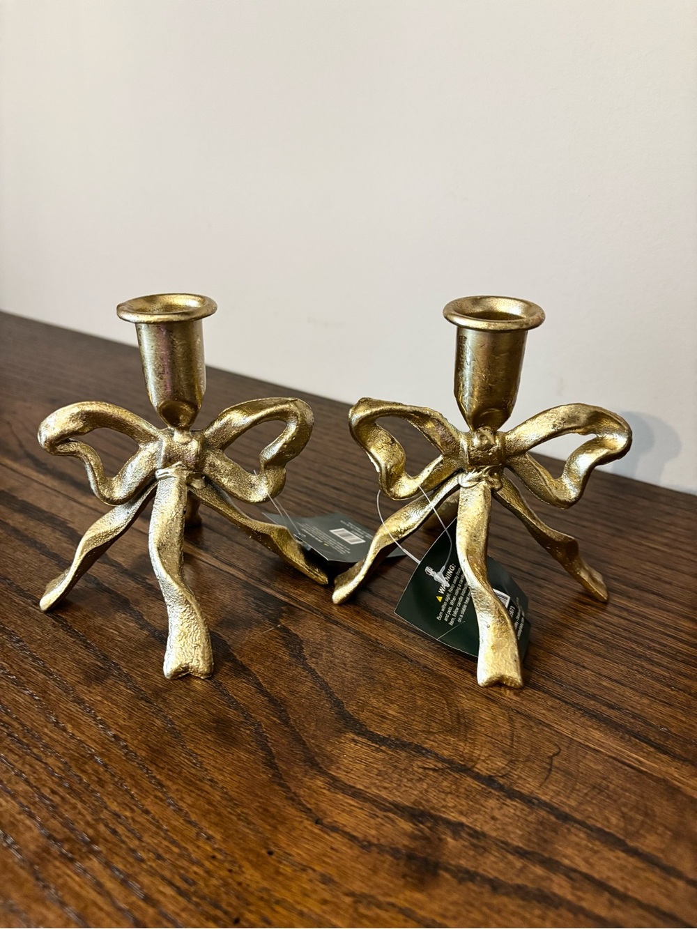 Set of 2 gold bow taper candle holders